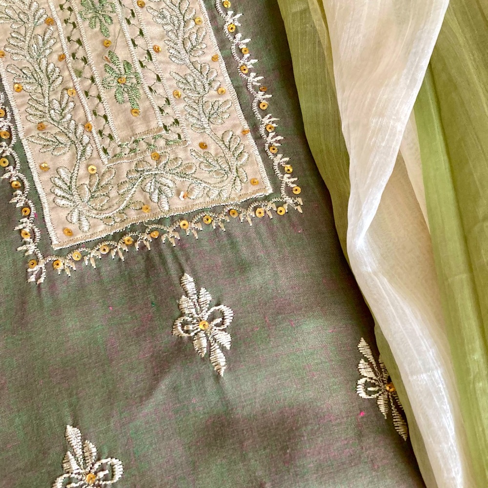 Elegant olive and beige lehenga set with pants and dupatta.